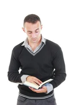 Handsome elegant young man reading book Stock Photos