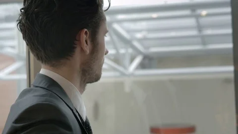 Handsome employee in the elevator going down to his office Video stock 75552042