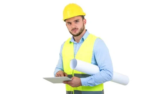Handsome engineer working with a tablet pc, isolated on white Stock Photos