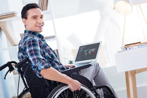 Handsome freelancer looking at camera Stock Photos