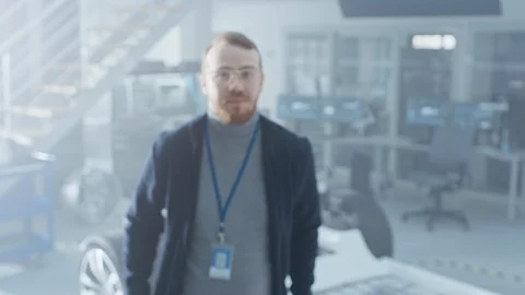 Handsome Ginger Creative Design Engineer with Beard and Glasses Poses for Camer Stock Footage 106760290