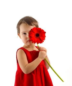 Handsome girl with flowers for mom, isolated on white background Stock Photos