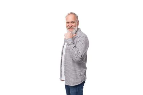 Handsome gray-haired elderly man with a beard in a checkered shirt on a white 스톡 사진