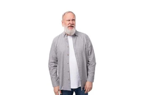 Handsome gray-haired elderly man with a beard in a checkered shirt on a white 스톡 사진