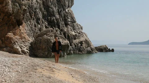 Handsome guy on the beach 動画素材 23144347