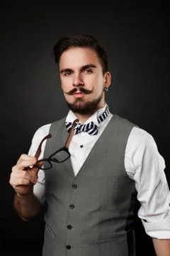Handsome guy with beard and mustache in suit Stock-Fotos