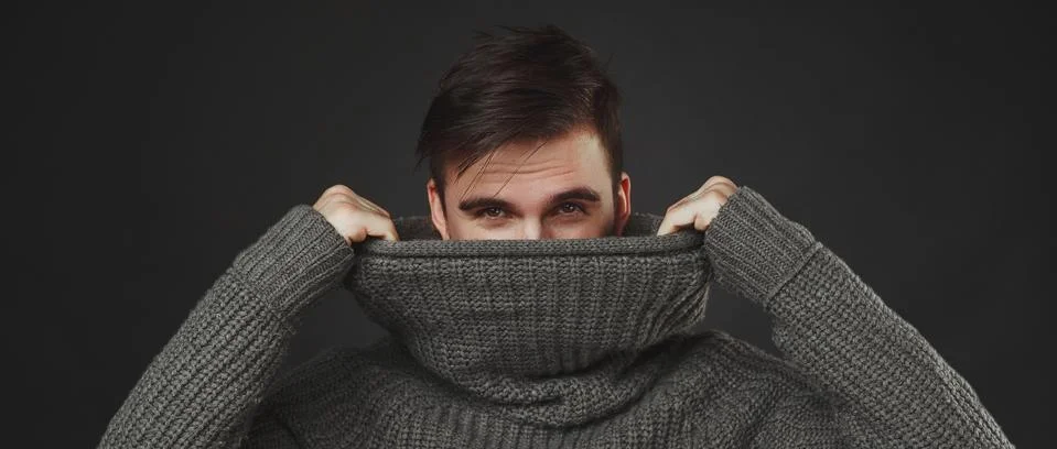 Handsome guy with beard in wool pullover Stock Photos