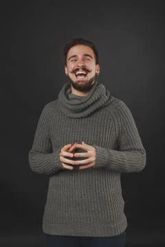 Handsome guy with beard in wool pullover Stock Photos