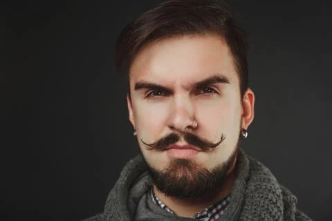 Handsome guy with beard in wool pullover Stock Photos