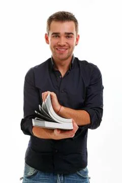 Handsome guy with book Stock Photos