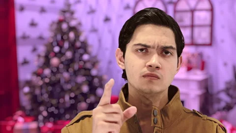 Handsome guy with Christmas background, 4K ProRes Video stock 164638817
