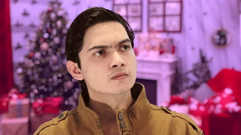 Handsome guy with Christmas background, 4K ProRes Video stock 164639153