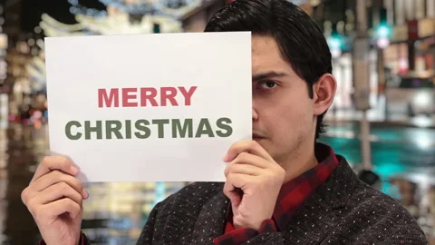 Handsome guy with Christmas background, 4K ProRes Video stock 164639417