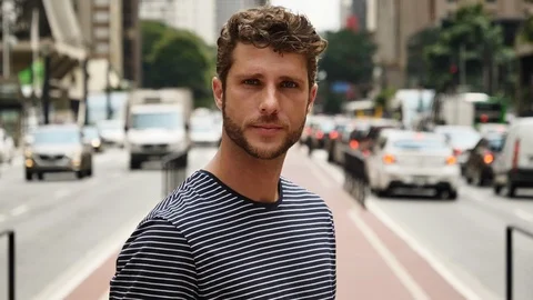 Handsome guy in city Stock Footage 93874251