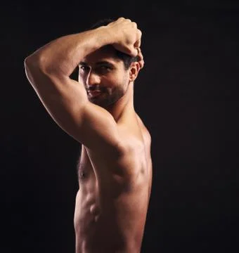 Handsome guy in the dark Stock Photos