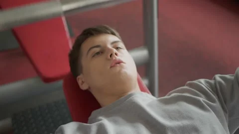 Handsome guy doing exercises with a barbell in the gym. Stock Footage 154894268