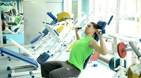 Handsome guy doing strength exercises in the gym 14 Stock-Footage 46778682