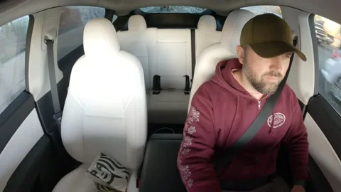 Handsome guy driving fast eco friendly electric car Artificial intelligence 스톡 동영상 237403245