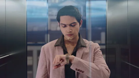 Handsome Guy in an elevator Video stock 197408405