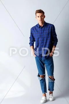 Handsome guy is evincing his sexuality Stock Photos