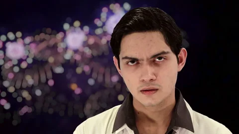 Handsome guy with Firework background, 4K ProRes Stock Footage 164637712