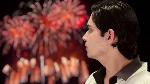 Handsome guy with Firework background, 4K ProRes Stock Footage 164637720