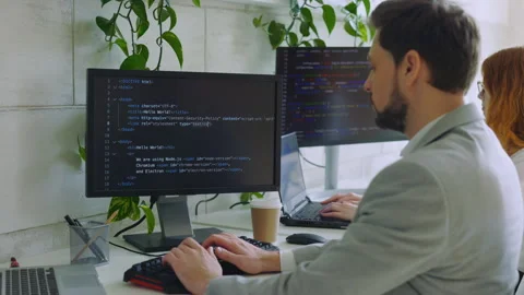 Handsome Guy, Freelance Data Work in Office Coding Programming on Big Data Stock Footage 257899857