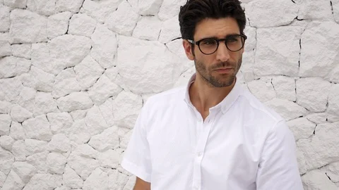 Handsome guy in glasses Stock Footage 89560378