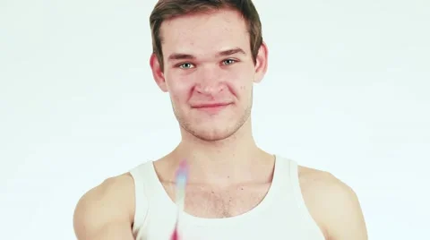 Handsome guy holding a toothbrush. Stock-Footage 59338167