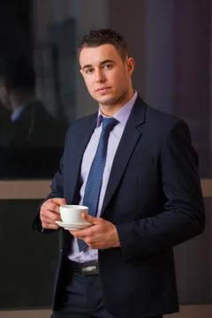Handsome guy isolated in black Stock Photos