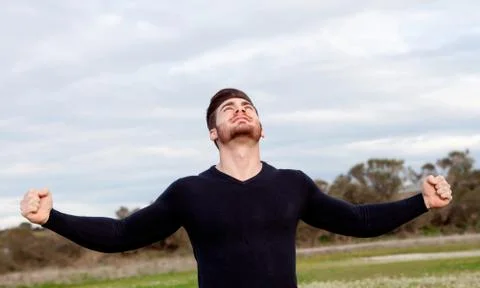 Handsome guy with open arms Stock Photos