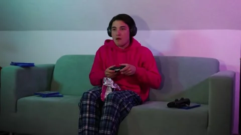 Handsome guy plays computer games on console.night game in ps5.young gamer Stock-Footage 253825776
