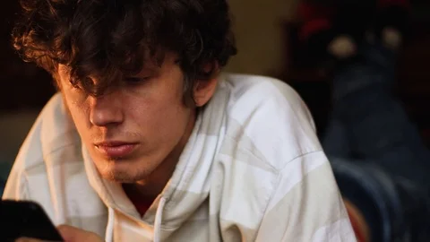 Handsome guy reads a message, bad news 動画素材 125090686