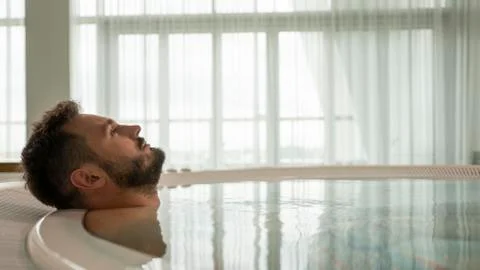 Handsome guy resting in the spa Stock Photos