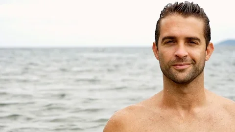 Handsome guy at sea Video stock 93995770