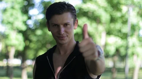 Handsome guy showing thumb up Stock-Footage 76254201