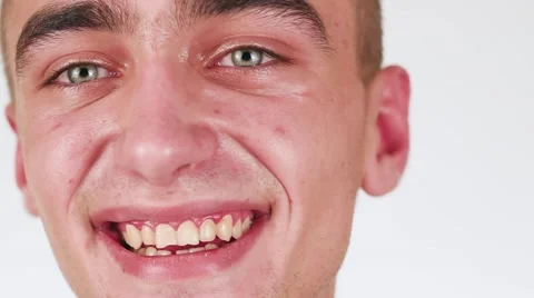 Handsome Guy Smiling Looking at The Camera. Fun and funny guy. Stock-Footage 58628398