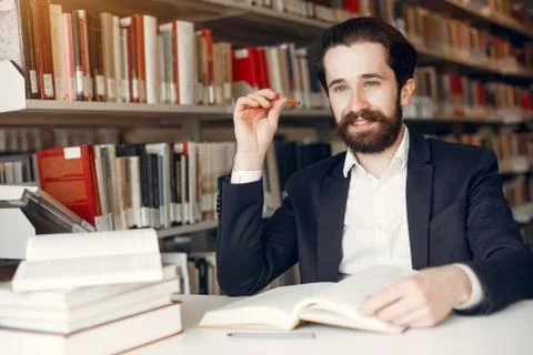 Handsome guy study at the library Stock Photos