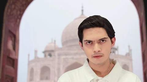 Handsome guy with taj mahal background, 4k Stock Footage 164328928