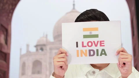 Handsome guy with taj mahal background, 4k Stock Footage 164329332
