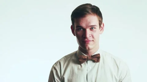 Handsome Guy Waving His Hand And Looking at The camera. Video stock 59311353