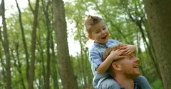 Cheerful african american father giving son piggyback ride outdoors  smiling, Happiness family concepts 6774671 Stock Photo at Vecteezy