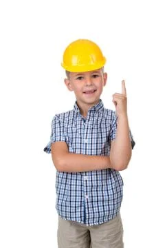 Handsome happy future builder dressed in blue checkred shirt grey jeans and Stock Photos