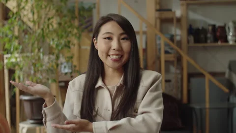 A handsome lady is gesturing and talking to the camera Stock Footage 170271891