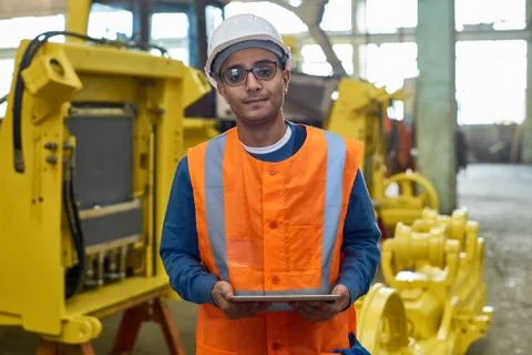 Handsome Machine Operator Posing for Photography Stock Photos