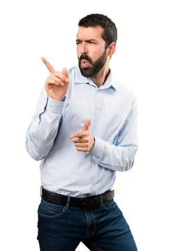 Handsome man with beard dancing Stock Photos