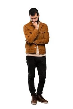 Handsome man with beard having doubts Stock Photos