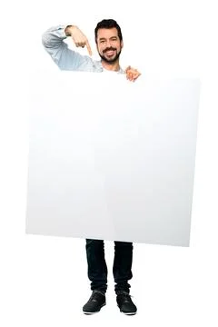 Handsome man with beard  holding an empty placard Stock Photos
