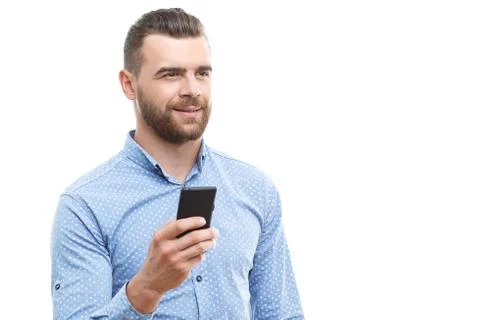 Handsome man with beard holding mobile phone Stock Photos