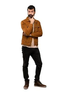 Handsome man with beard thinking Stock Photos
